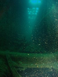 A corridor running across the bridge of the Heian Maru served as a temporary store for periscopes. After ascending through the silty bowels of the wreck we found the scopes on the floor ahead of us...